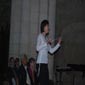 Aurélie Rustique qui dirige un orchestre